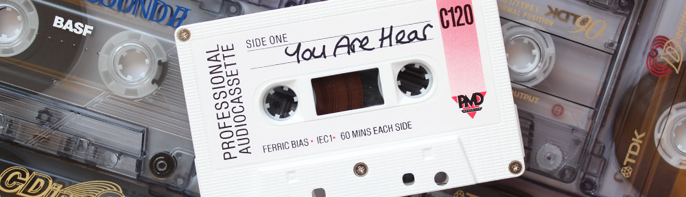 You Are Hear banner showing cassette tapes