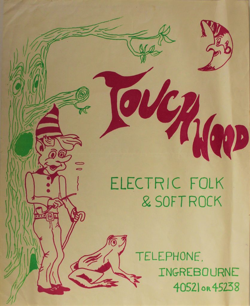 Poster for 'Touchwood: Electric folk & soft rock', with a white background and text in pink and green. To the left is an illustration of a tree, an imp, and a frog, and to the top right is a moon with a hat and face.